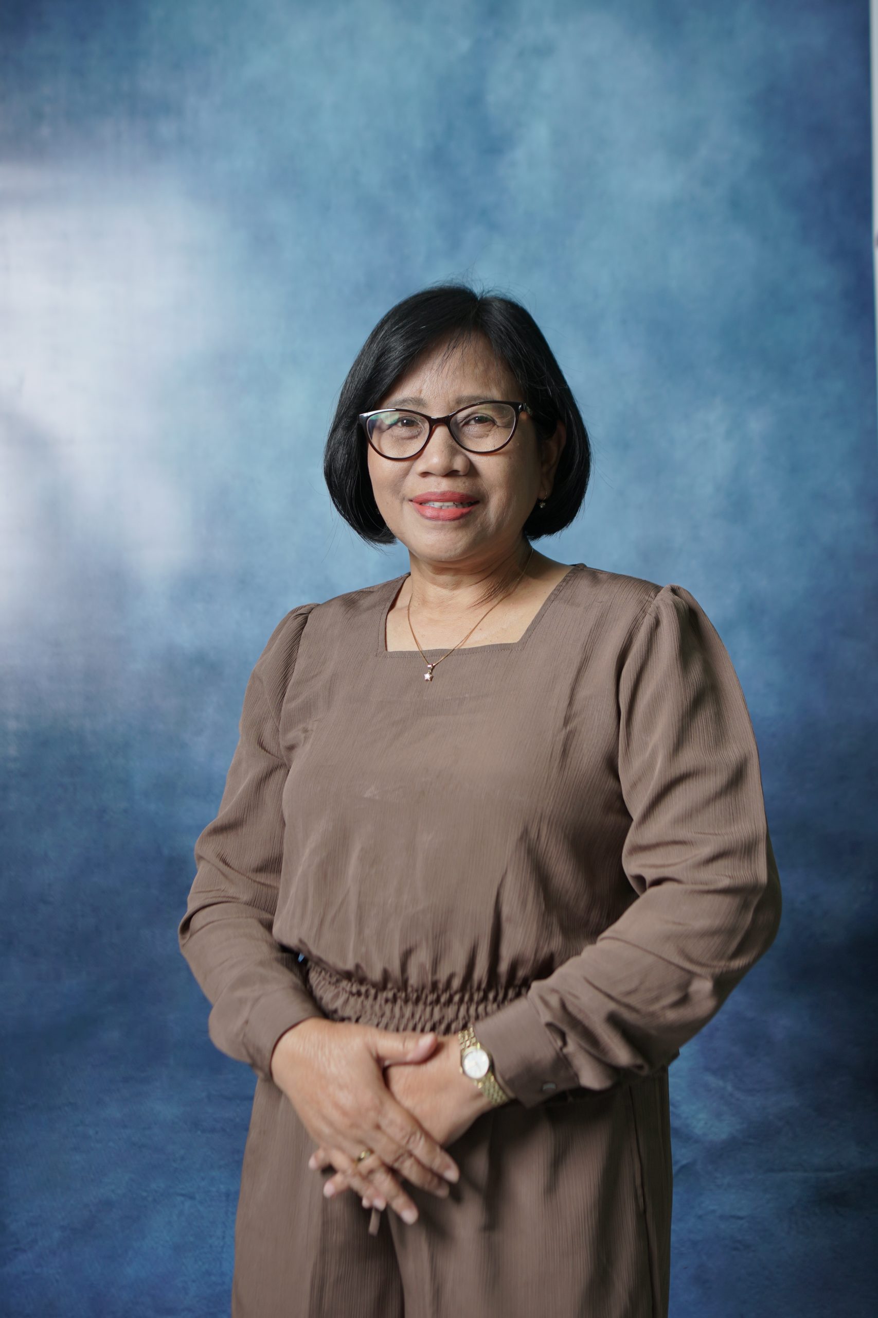 Dra.Tri Asih